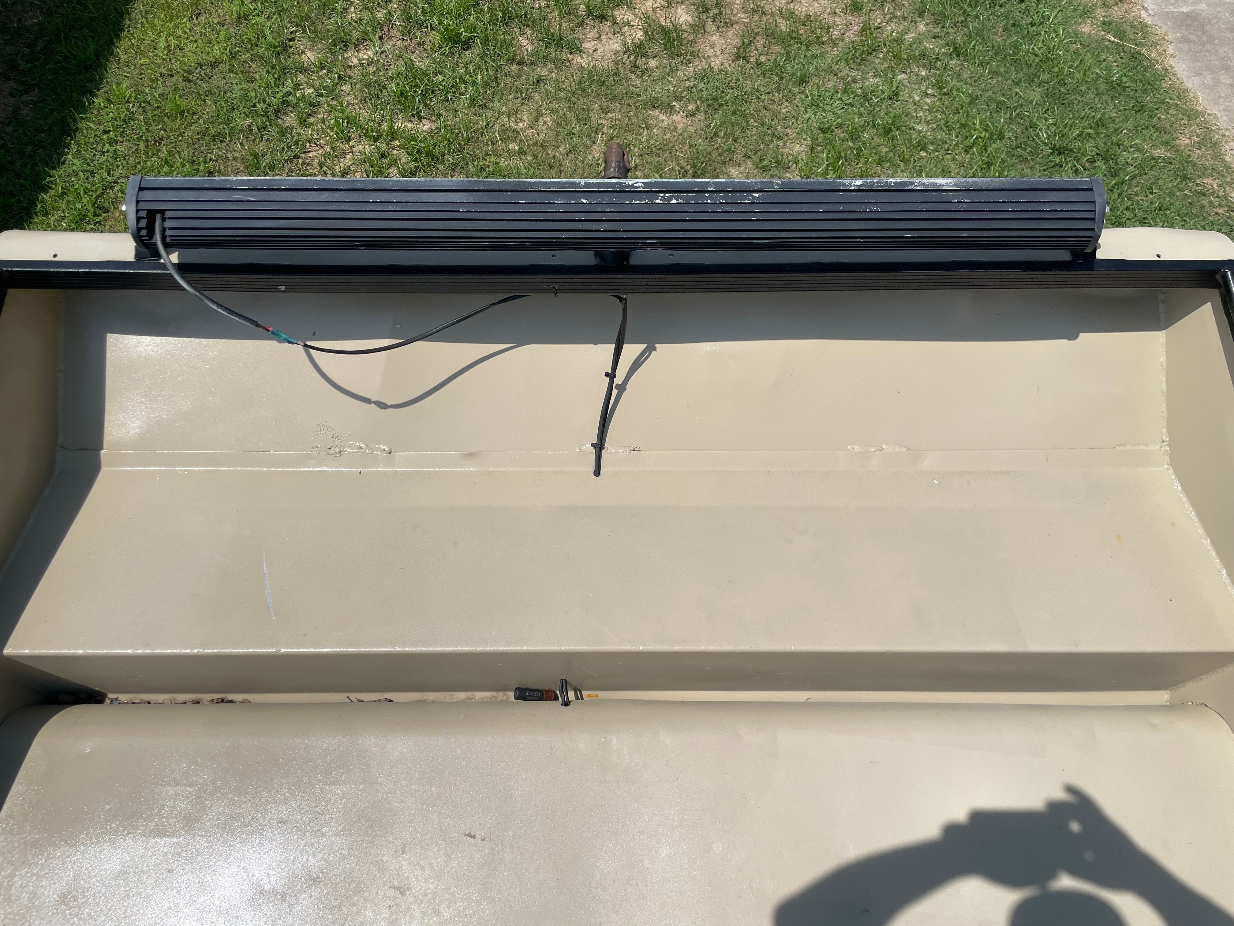 LED light bar mounted on freshly painted airboat bow deck