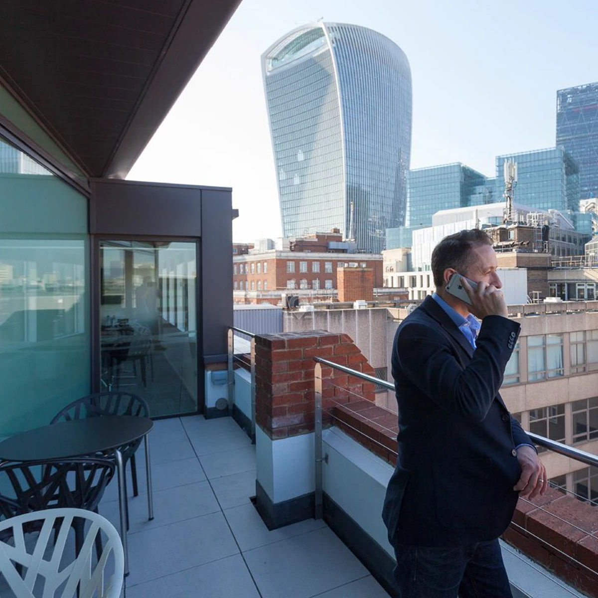 man talking on the phone- on Tally Workspace