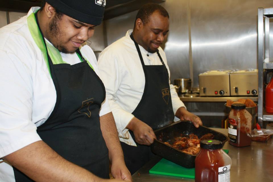 two chefs cooking