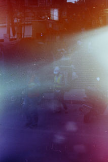 Violet and cyan film photograph by Blue Nile