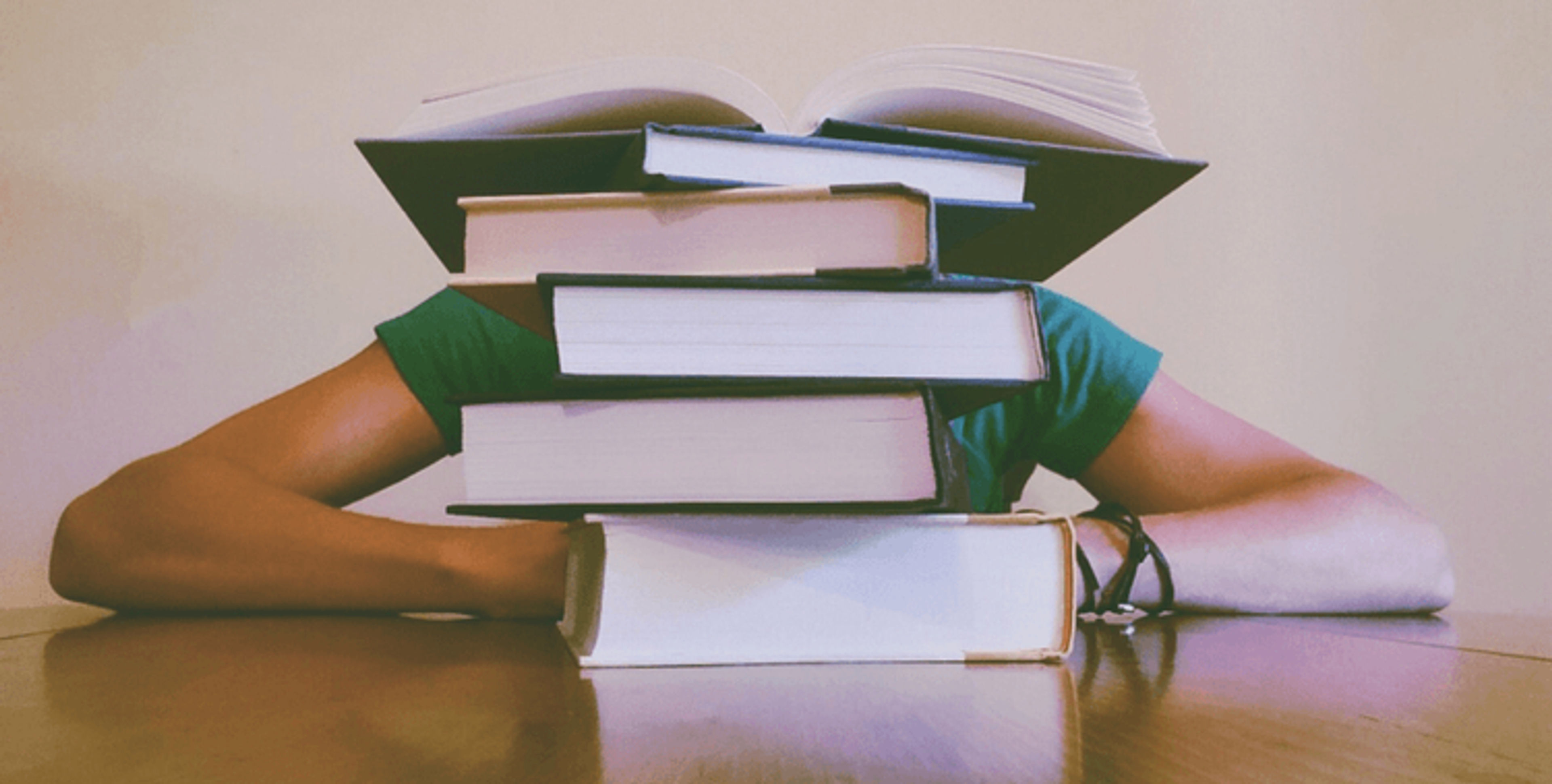 medical student studying with books