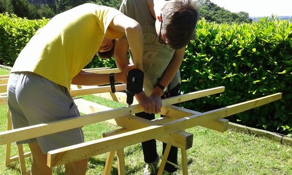 Drilling of the holes through the floor grid and the main beams