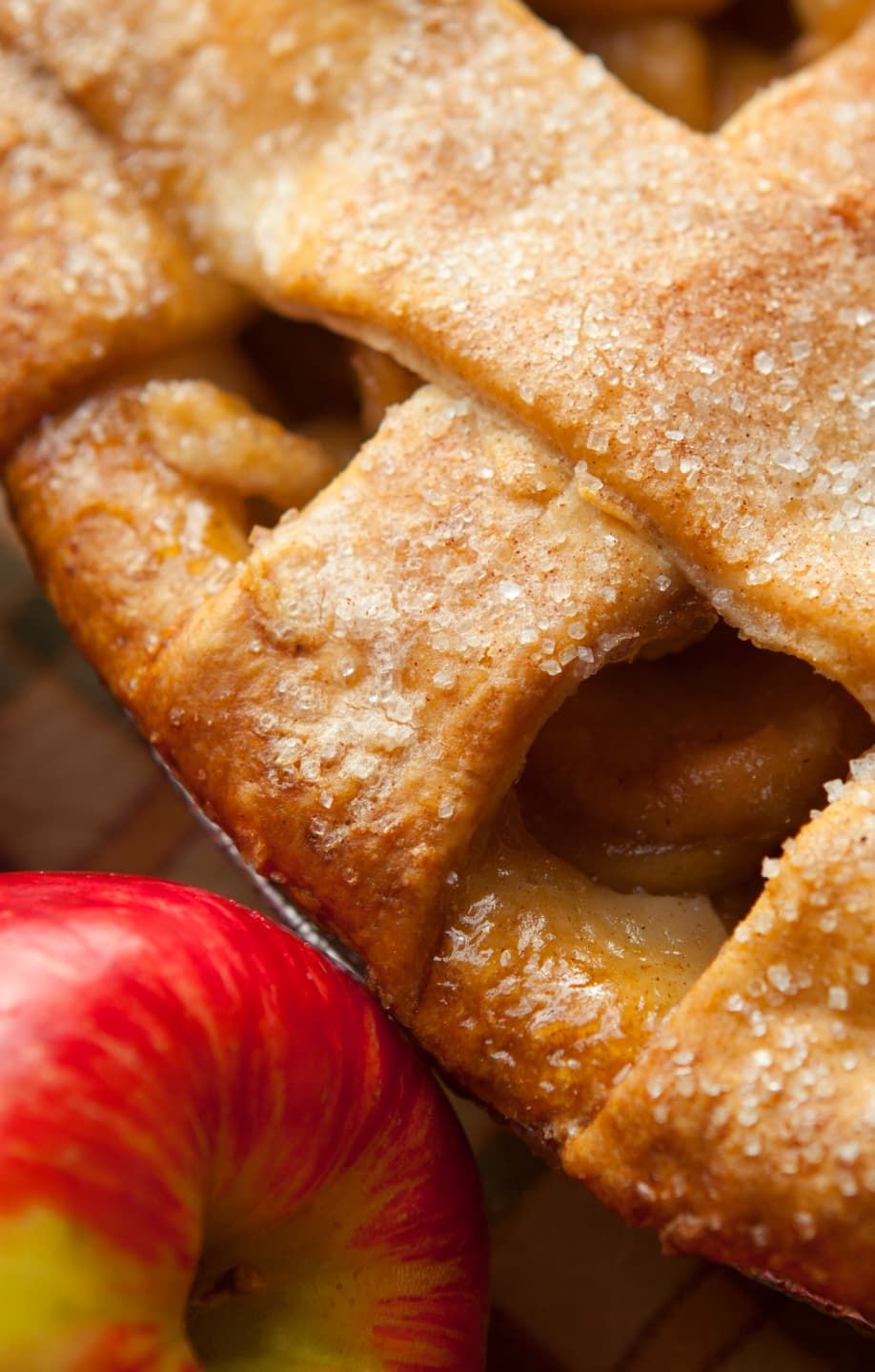 A fresh, delicious-looking apple pie cooling on a countertop