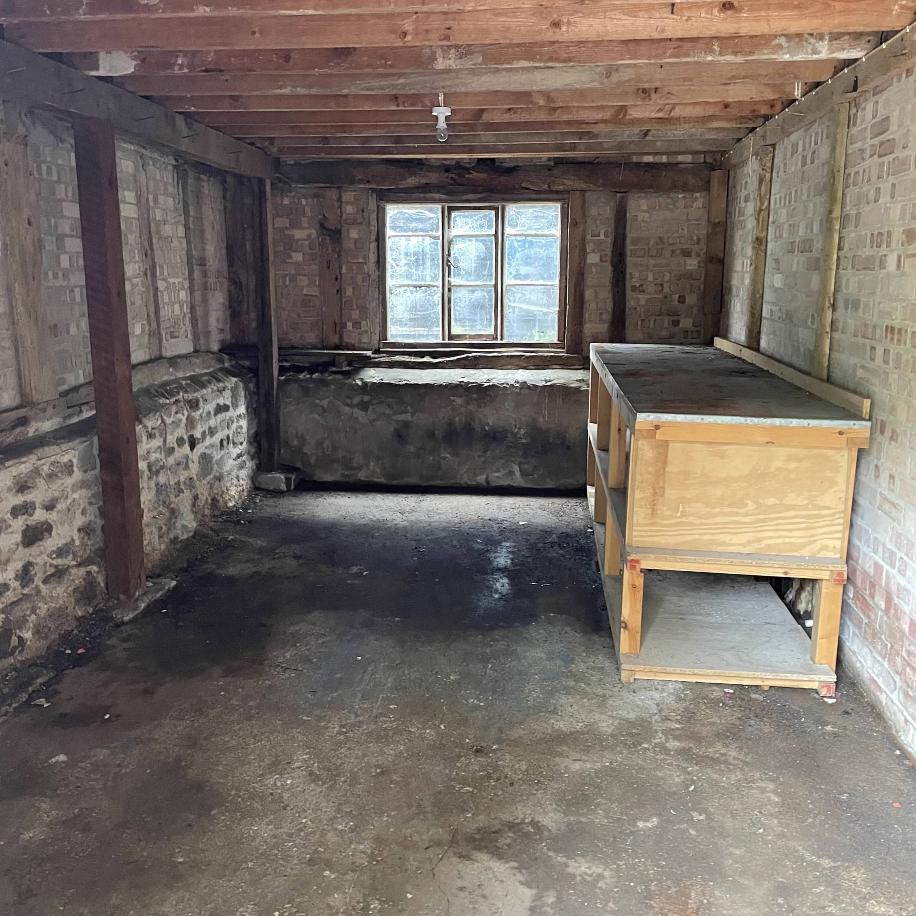 A cellar swept clear and ready after a clearance