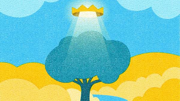 A tree among golden clouds under a crown in the sky shining light onto the tree.
