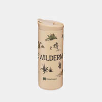 Photo of a tan Wilderness tumbler with desert plant illustrations.