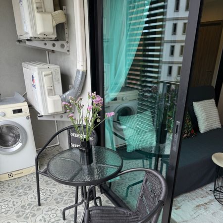 Balcony with table and chairs