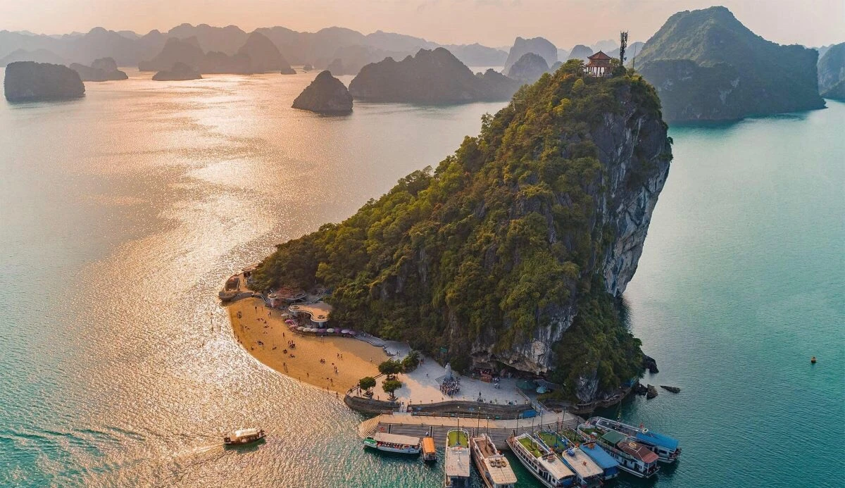 Titop Island in Ha Long Bay with a small beach and a panoramic viewpoint from the mountain top