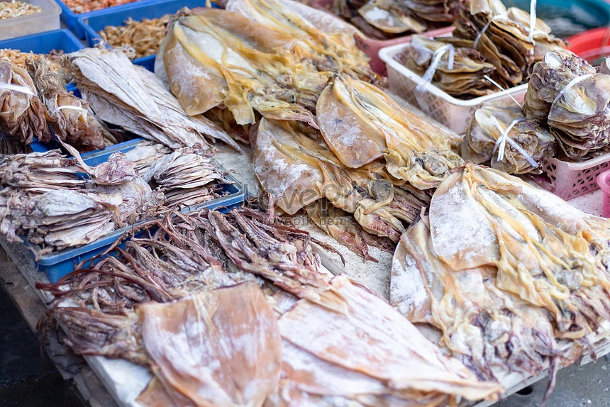 Various dried seafood products displayed at a specialty shop in Ha Long