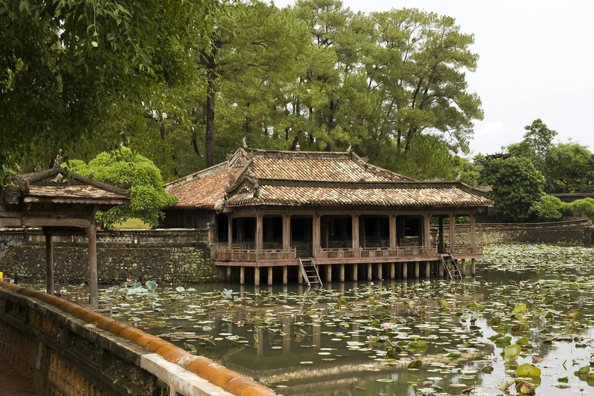 Tu Duc Tomb in Hue with ancient architecture, spacious gardens, and a peaceful atmosphere