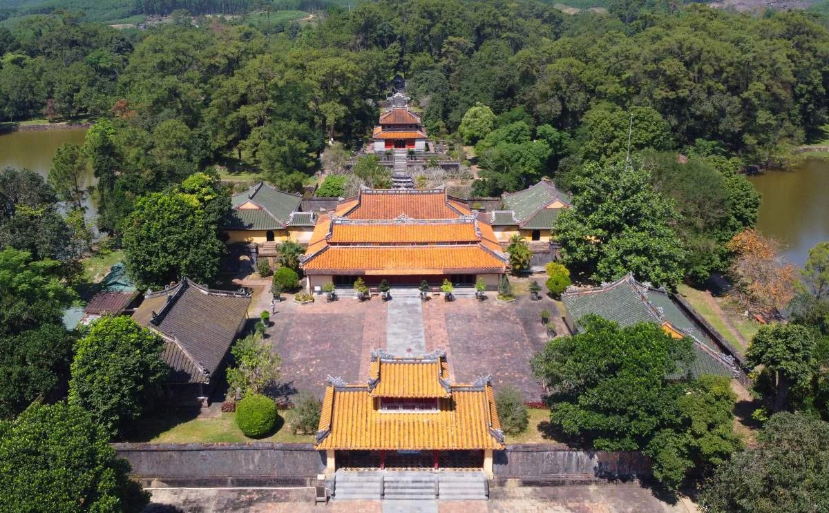 Panoramic view of Minh Mang Tomb in Hue with a symmetrical architectural axis and ancient triple gate