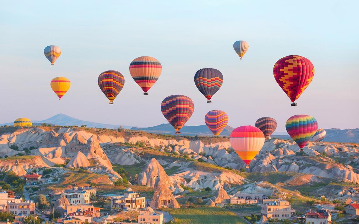 Mystical Cappadocia: Explore valleys and ancient caves, and enjoy the sensation of flying in a hot air balloon.