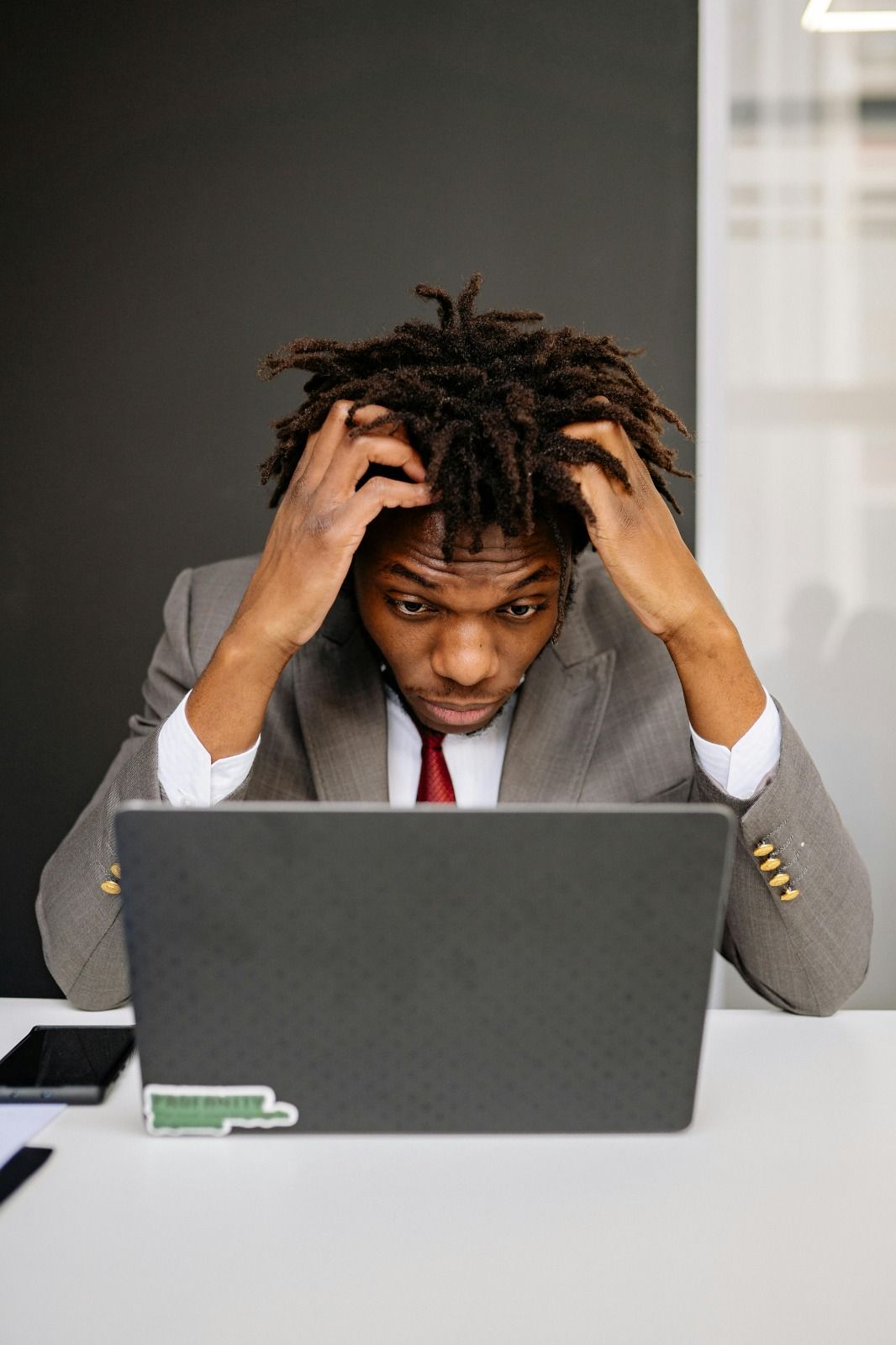 Exhausted professional feeling the weight of stress