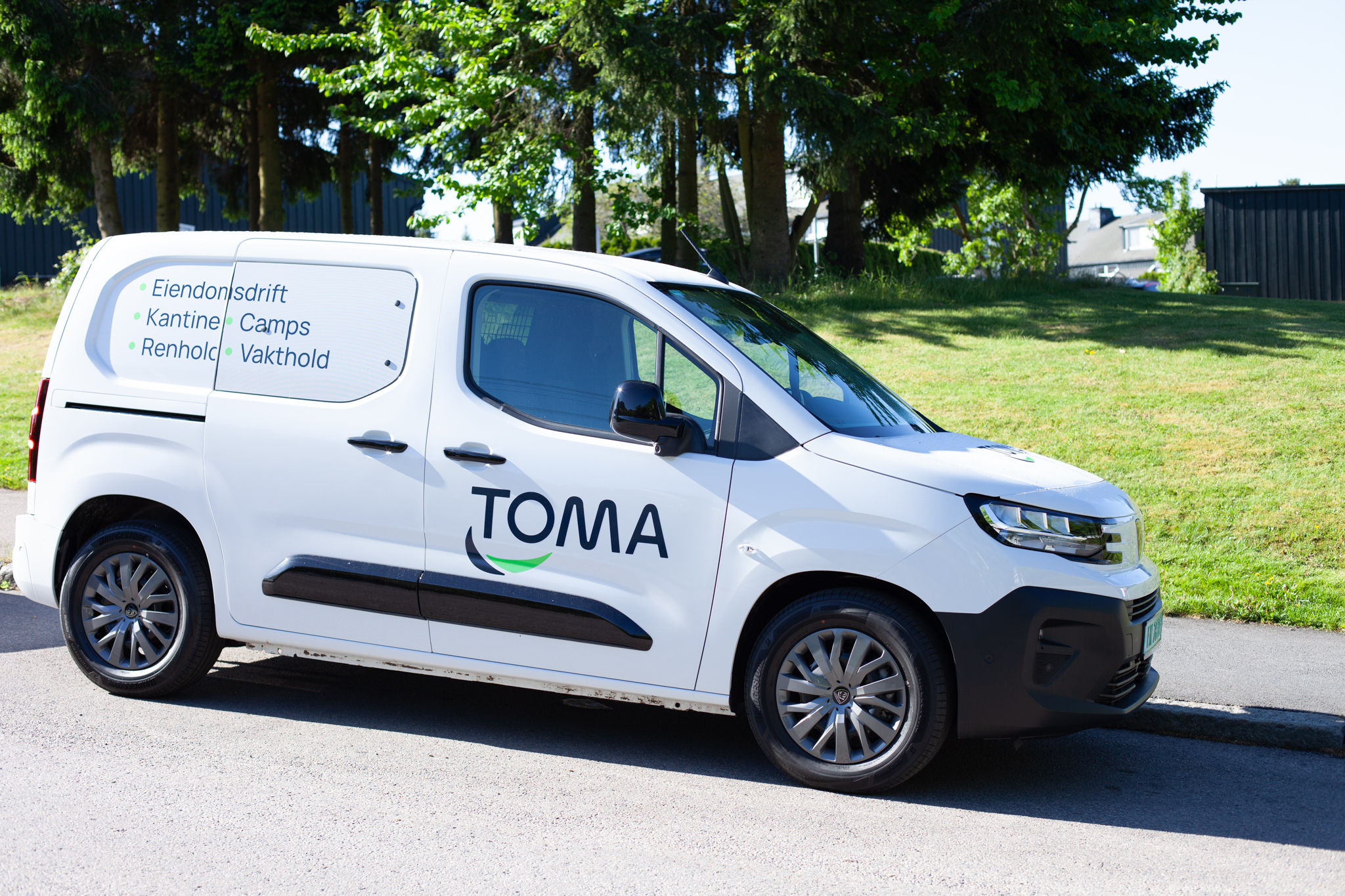 Tomagruppen logo