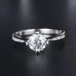 1.00CT MOISSANITE ENGAGEMENT RING, FOUR CLAW SHOULDER SET DESIGN