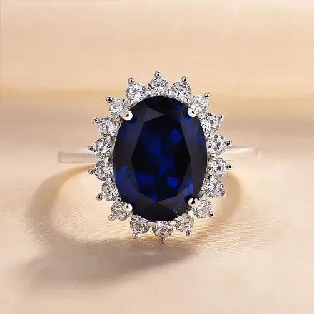 Picture of Luxurious Halo Oval Cut Blue Sapphire Engagement Ring In Sterling Silver