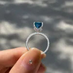 Picture of Exclusive Cushion Cut Montana Blue Sapphire Engagement Ring In Sterling Silver