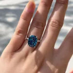 Picture of Exclusive Cushion Cut Montana Blue Sapphire Engagement Ring In Sterling Silver