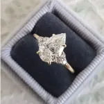 Picture of Yellow Gold Pear Cut Moissanite Diamonds Engagement Ring In Sterling Silver