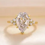 Picture of Yellow Gold Pear Cut Moissanite Diamonds Engagement Ring In Sterling Silver