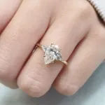 Picture of Yellow Gold Pear Cut Moissanite Diamonds Engagement Ring In Sterling Silver