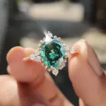 Picture of Vintage Rose Gold Oval Cut Paraiba Tourmaline Engagement Ring In Sterling Silver