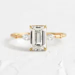 Picture of Classic Yellow Gold Emerald Cut Three Stone Engagement Ring For Women In Sterling Silver