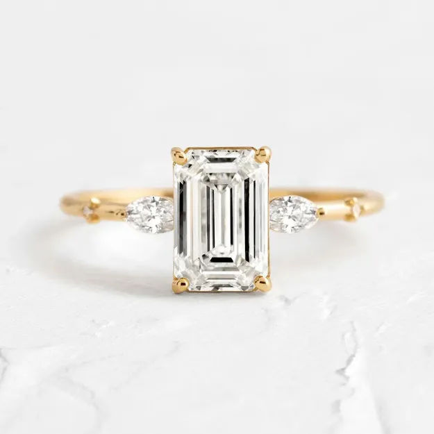 Picture of Classic Yellow Gold Emerald Cut Three Stone Engagement Ring For Women In Sterling Silver