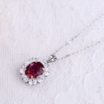 Picture of 1.8 Carat Ruby Oval Cut Halo Pendant with Necklace In Sterling Silver