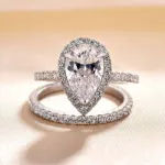 Picture of Halo Pear Cut Created White Sapphire Wedding Ring Set In White Gold