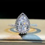 Picture of Halo Pear Cut Created White Sapphire Wedding Ring Set In White Gold