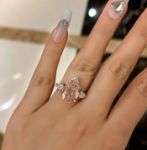 Picture of Elegant Rose Gold Pear Cut Pink Sapphire Three Stone Engagement Ring In Sterling Silver