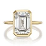 Picture of Unique Yellow Gold Emerald Cut Bezel Engagement Ring In Sterling Silver