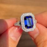 Picture of Luxurious Double Halo Split Shank Blue Sapphire Emerald Cut Engagement Ring In Sterling Silver