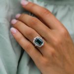 Picture of Yellow Gold Halo Emerald Cut Emerald Green Engagement Ring In Sterling Silver