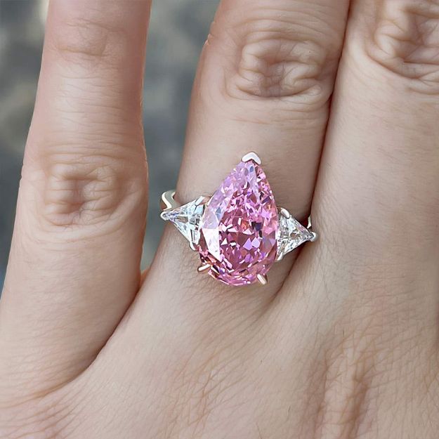 Picture of Elegant Pear Cut Pink Sapphire Three Stone Engagement Ring In Sterling Silver