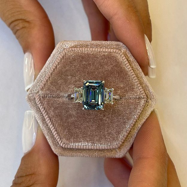 Picture of Luxurious Emerald Cut Three Stone Aquamarine Blue Engagement Ring In Sterling Silver