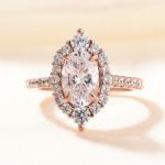 Picture of Rose Gold Unique Design Halo Oval Cut Moissanite Diamond Engagement Ring In Sterling Silver