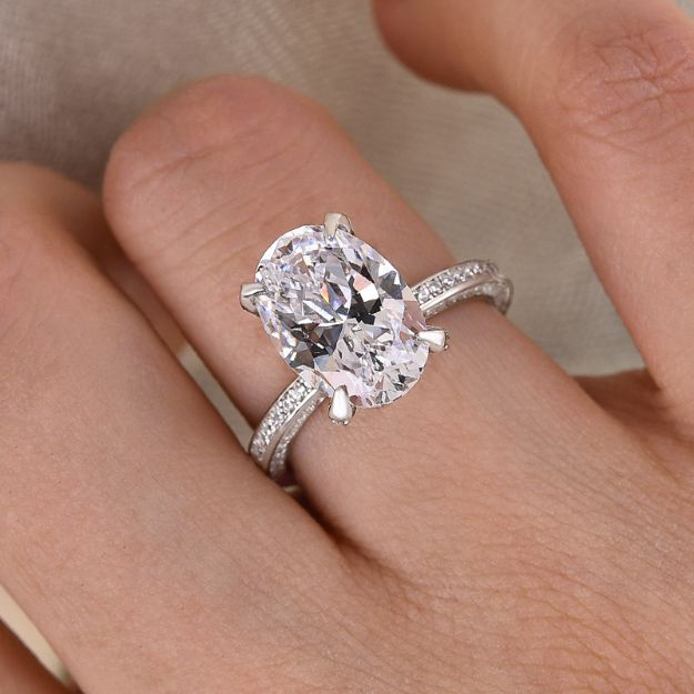 Picture of Exclusive Oval Cut Moissanite Diamond Engagement Ring In Sterling Silver