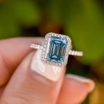 Picture of Halo Emerald Cut Light Aquamarine Blue Engagement Ring In Sterling Silver