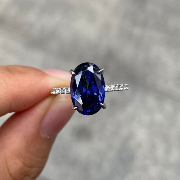 Picture of 3.5 Carat Classic Blue Sapphire Oval Cut Simulated Diamond Engagement Ring In Sterling Silver