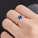 Picture of Rose Gold Twist 1.25 Carat Round Cut Blue Sapphire Engagement Ring For Her In Sterling Silver