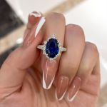 Picture of Gorgeous Halo Split Shank Oval Cut Blue Sapphire Engagement Ring In Sterling Silver