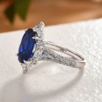 Picture of Gorgeous Halo Split Shank Oval Cut Blue Sapphire Engagement Ring In Sterling Silver