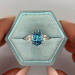 Picture of Fashion Oval Cut Three Stone Aquamarine Blue Engagement Ring In Sterling Silver