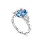 Picture of Fashion Oval Cut Three Stone Aquamarine Blue Engagement Ring In Sterling Silver