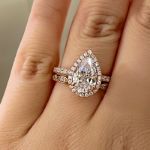 Picture of Rose Gold 2.2 Carat Halo Pear Cut Lab Created White Sapphire Wedding Ring Set