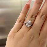 Picture of Rose Gold 2.2 Carat Halo Pear Cut Lab Created White Sapphire Wedding Ring Set