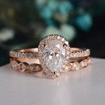 Picture of Rose Gold 2.2 Carat Halo Pear Cut Lab Created White Sapphire Wedding Ring Set