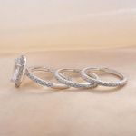 Picture of Exquisite Halo Pear Cut 3PC Wedding Ring Set In Sterling Silver